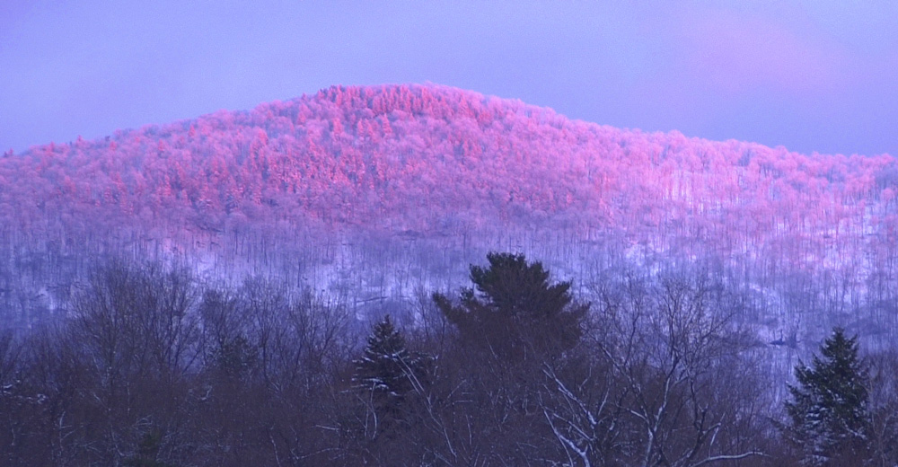 West Rutland, VT: The sunset reflecting on the mountain range east of Rutland City on a cold December day.