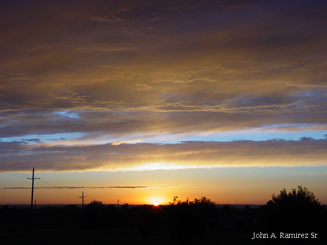 Paola, KS : Backyard Sunset by John Ramirez