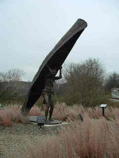 Akron, OH: Bronze Statue on Portage Trail Path Road by a city walking trail
