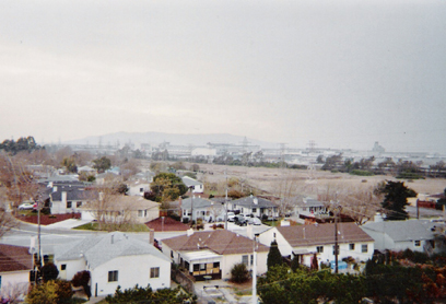 Millbrae, CA: I took the shot from the Millbrae, Ca Cal-train parking garage toward the SF airport. Looking closely there is a plane taking flight