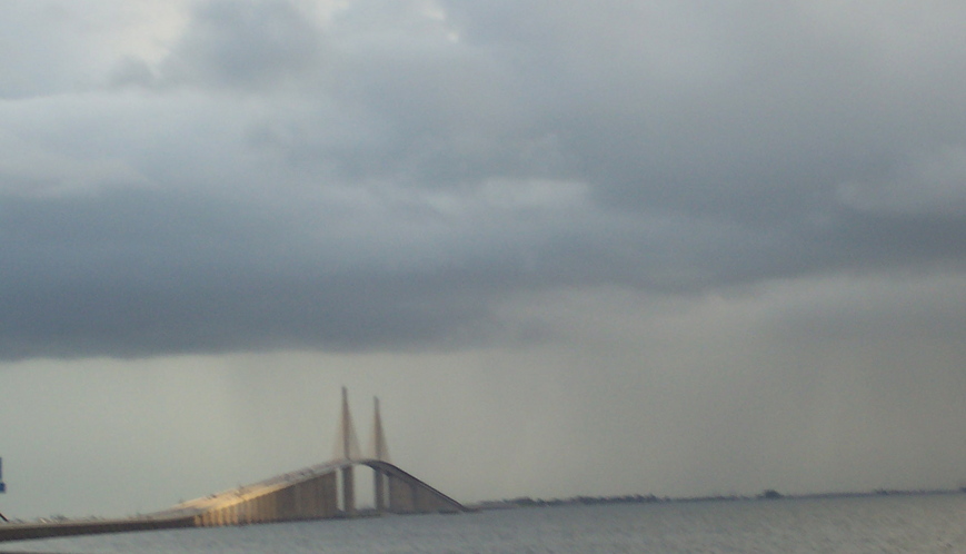 Tampa, FL: View of the Sunshine Skyway Bridge, Tampa Bay, FL, with storm rolling in