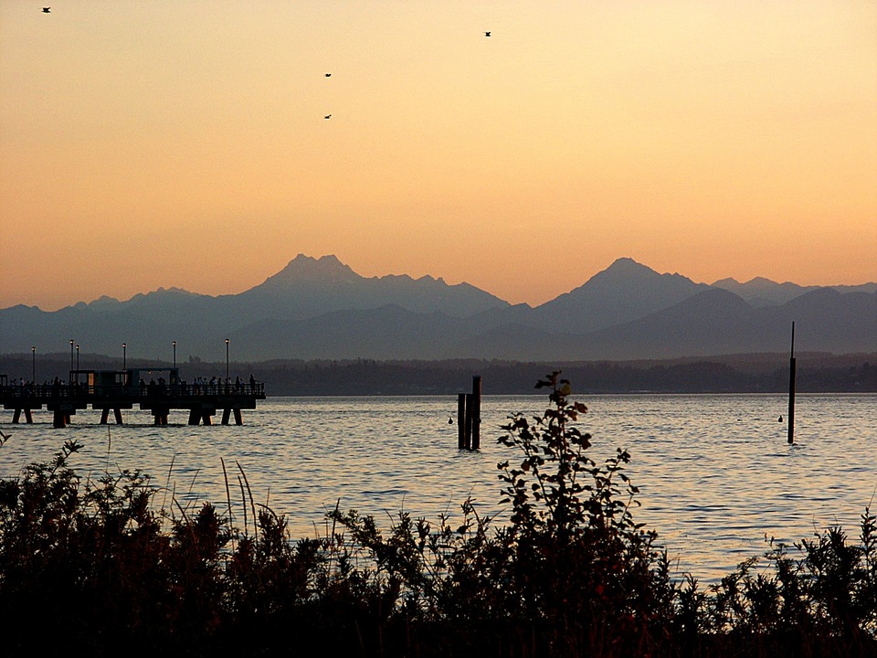Edmonds, WA: Edmonds fishing pier on Puget Sound, with Olympic Mountains in background, in August, 2004.