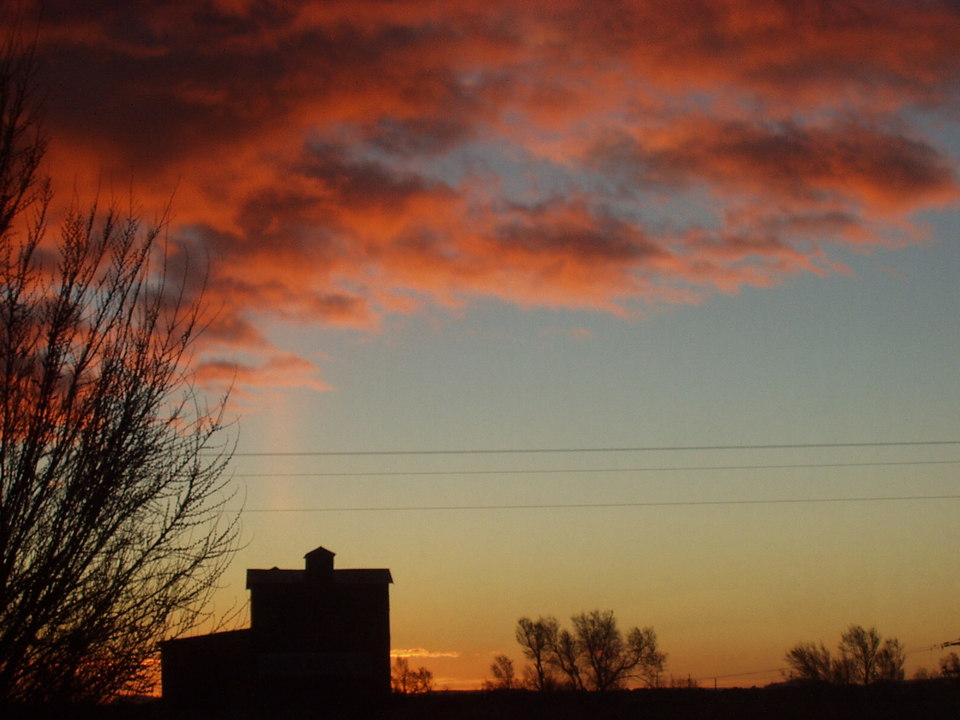 Mountainair, NM : Mountainair Sunrise from a window at the Shaffer Hotel.