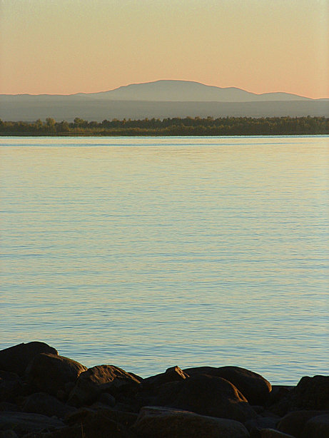 Lyon Mountain, NY: Sunset over Lyon Mountain as seen across Lake Champlain in Alburg Vermont