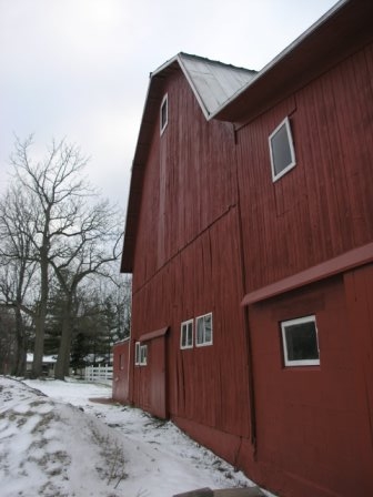 Haslett, MI: A large, old barn on a cold winter's day in Haslett, Michigan.