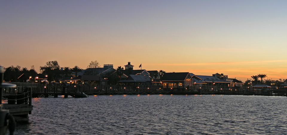 The Villages, FL: Sumter Landing and Lake Sumter at dusk, facing west.