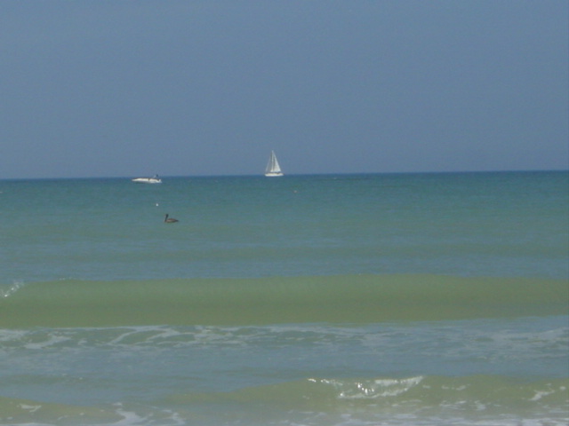 Naples, FL : Boats just off shore at the Naples Beach