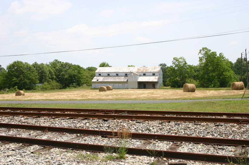 Bowersville, GA: Barn and field - looking across railroad tracks from town center.