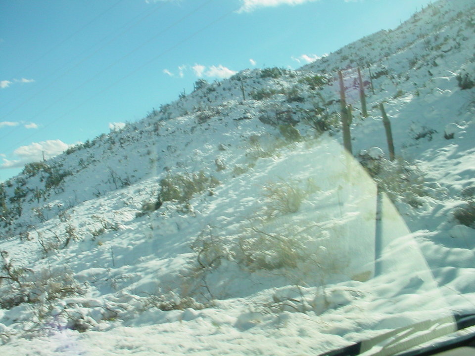Kearny, AZ: Going down Superior road into Kearny, during a snowfall March '06.