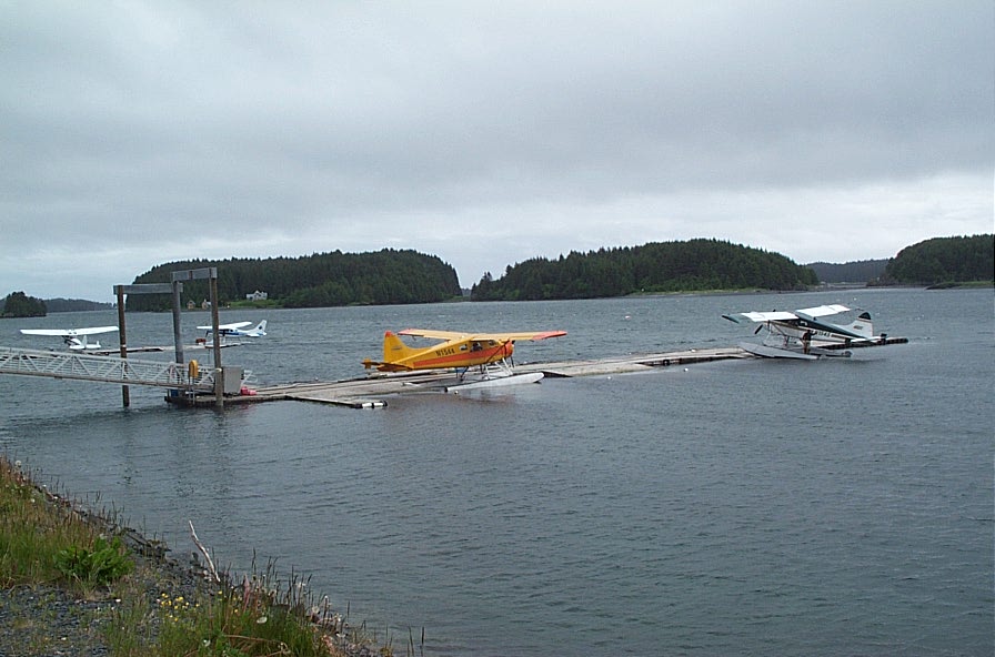 Kodiak, AK: A plane landing next to Kodiak Island