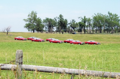 Clark, SD: The Parade - Ken Bell's "Parade" of 1976 Ford LTDs greet visitors on the West edge of Clark along Highway 212. One of a collection of conversation peces by Ken Bell. Clark South Dakota