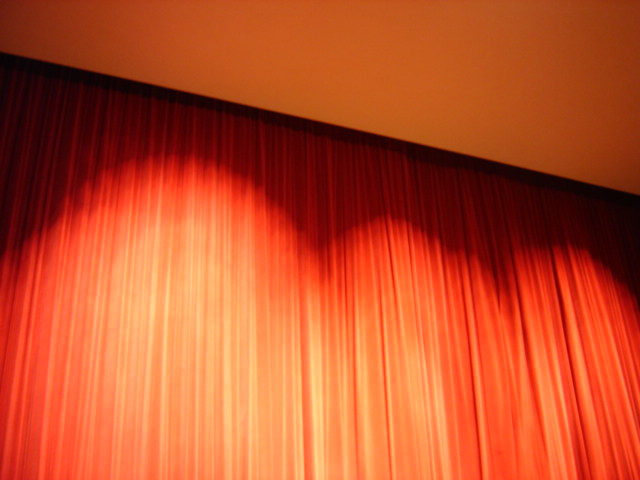 East Porterville, CA: The red curtains of the Buck Shaffer Auditorium.