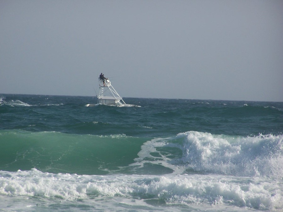 Destin, FL: A boat tossed by the waves