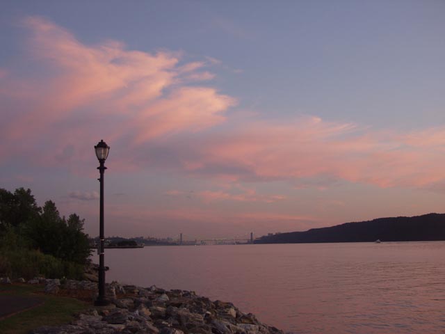 Yonkers, NY: Manhattan skyline at sunset from the Sculpture Meadow on the Hudson in Yonkers