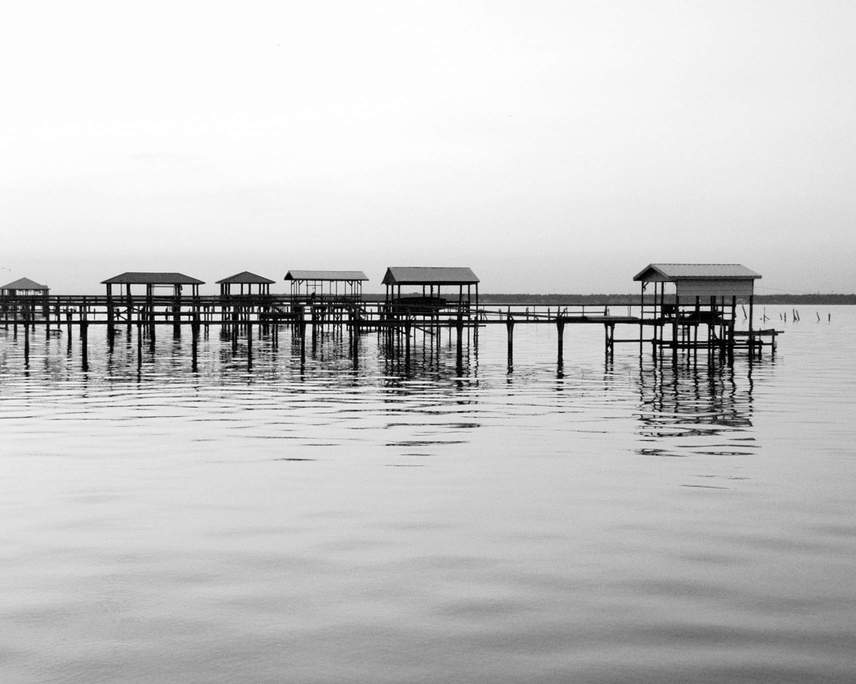 Bay St. Louis, MS: Fishing piers along the beach front in Bay St. Louis