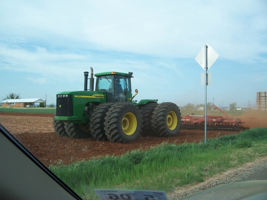 Trent, TX: Farmers plant spring wheat Crops near Trent