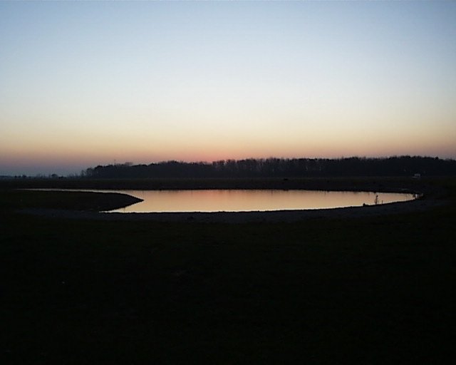 McComb, OH: Looking to the west at sunset over our pond.
