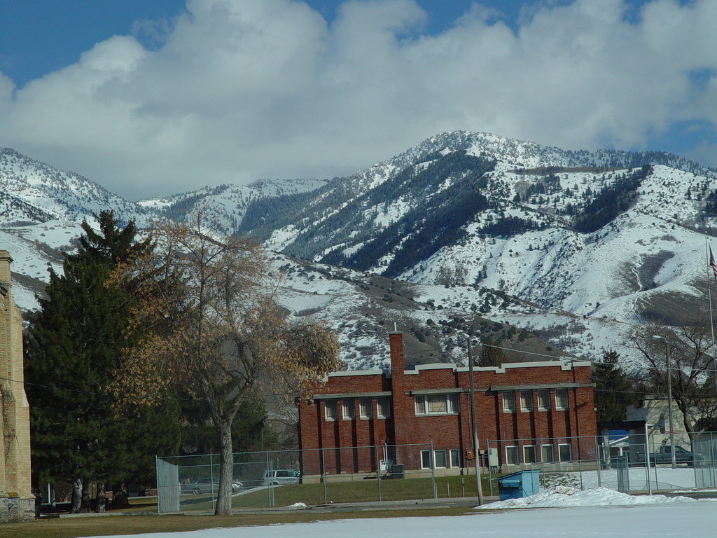 Smithfield, UT: Carnegie Library (back side with moutains in background. This was one of the first Carnegie Libraries