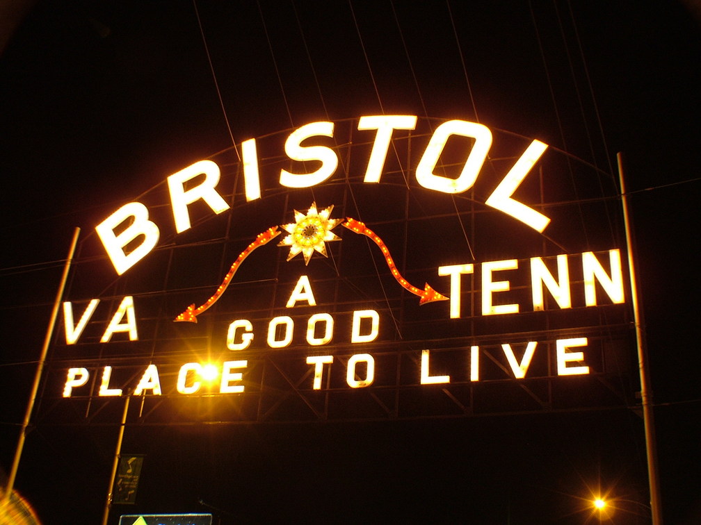 Bristol, TN: This sign crosses the state line between VA & TN. The state line follows State Street which is the main street of Bristol.