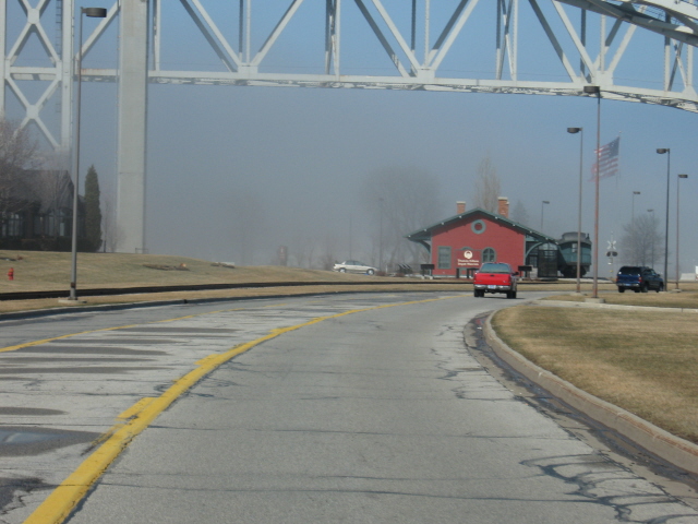 Port Huron, MI: Fog rolling in by the Blue Water Bridges and the Edison Depot