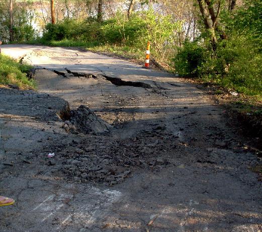 Chesapeake, OH : village road in need of repair