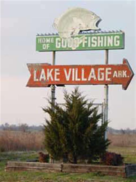 Lake Village, AR: vintage "home of good fishing sign"