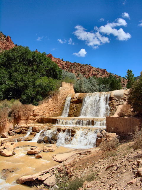 Cedar City, UT: A view of a man made waterfall off of the Coal Creek Parkway Trail found in Cedar Canyon. You can start this trail in many places one can be found at Canyon Park.