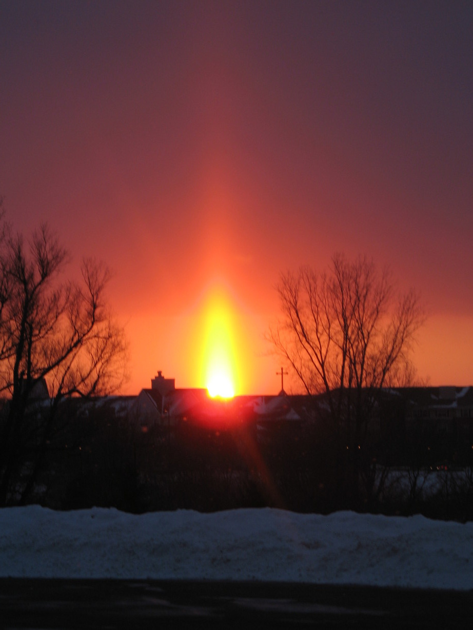 Chanhassen, MN: Spectacular sunrise over Chanhassen (cross is St. Hubert's) ( Photo should be viewed vertically)