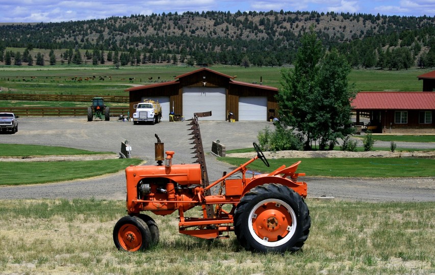 Crooked River, OR : Orange tractor...