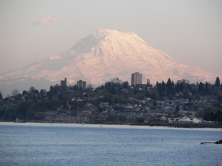 Tacoma, WA: City of Tacoma and Puget Sound waterfront near sunset time set against Mt Rainier