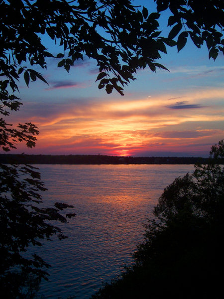 Grand Island, NY: "Sunset In A Heart"- The view of the Niagara River from the West River on Grand Island, NY