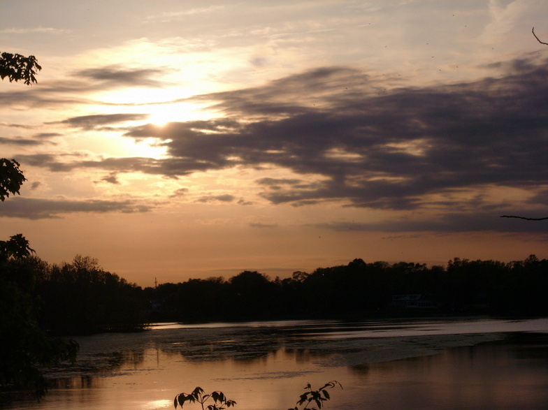 Alma, MI: the pine river at sunset from the park
