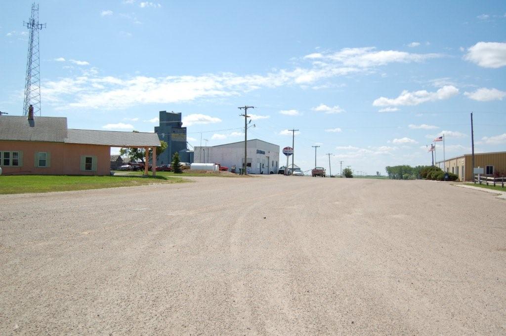 Antler, ND: The old Gas Station ahead on the left