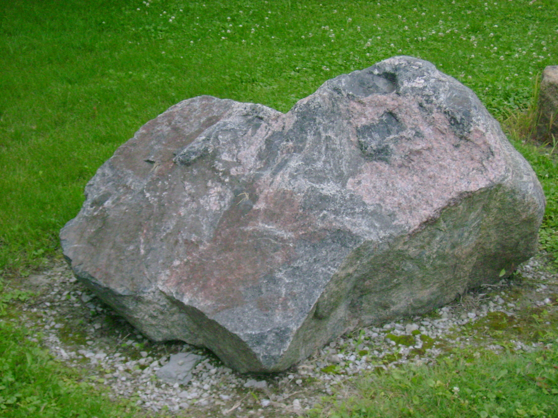 Pioneer, OH : Rock beside the drive behind the hardware store.