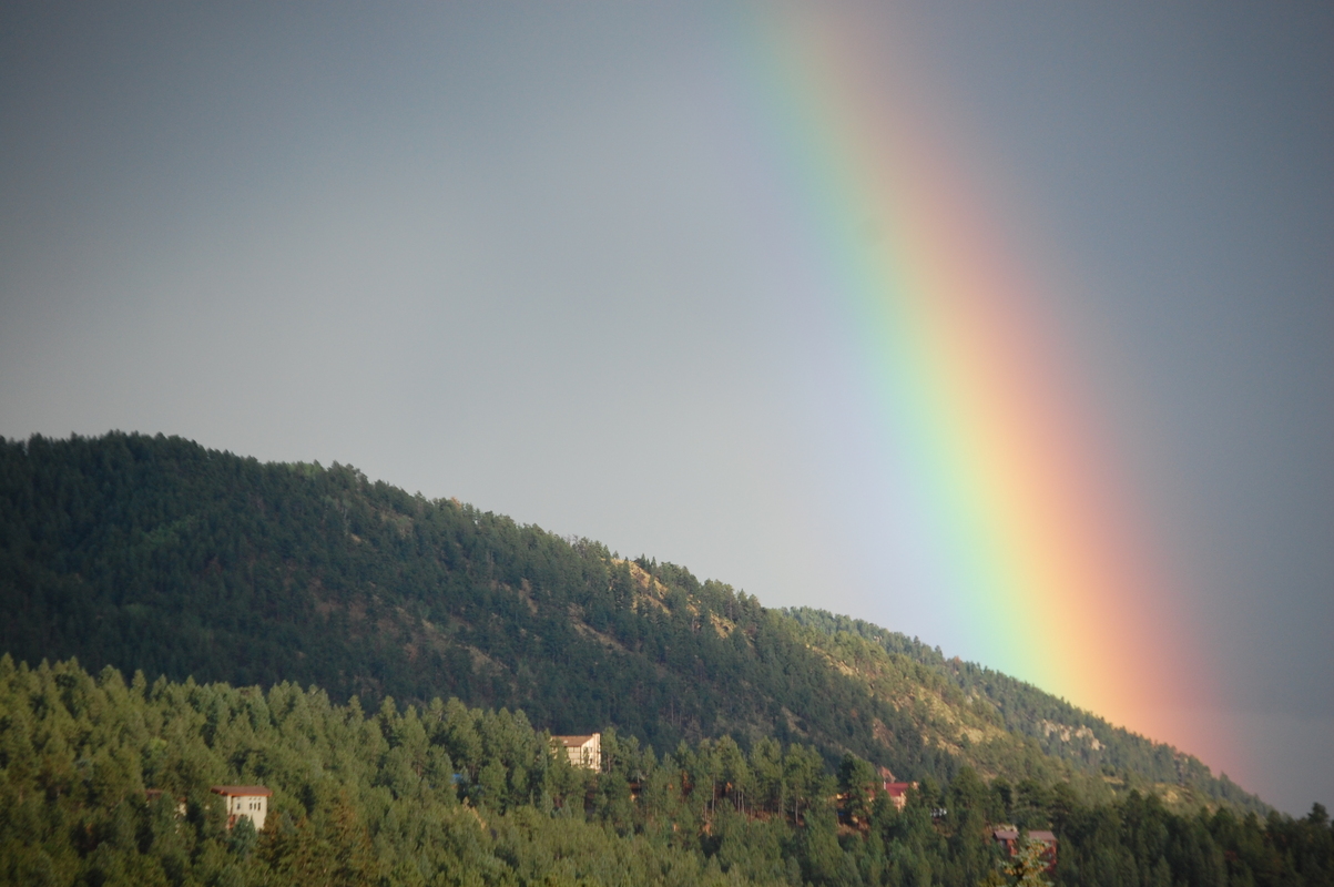 Woodland Park, CO: Rainbow over Rampart Range, taken from the Ute Pass Cultural Center, Woodland Park