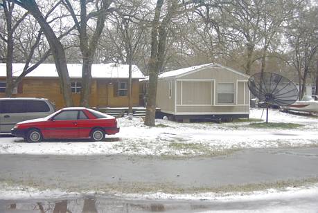 Tool, TX: Snowy residences on Makemo Street during January 2003