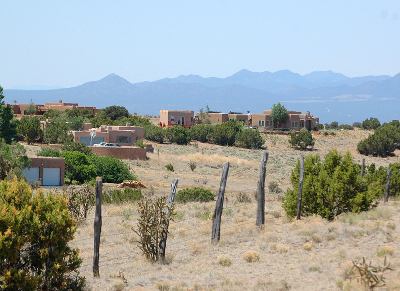 Eldorado at Santa Fe, NM Homes in Eldorado from a trail photo