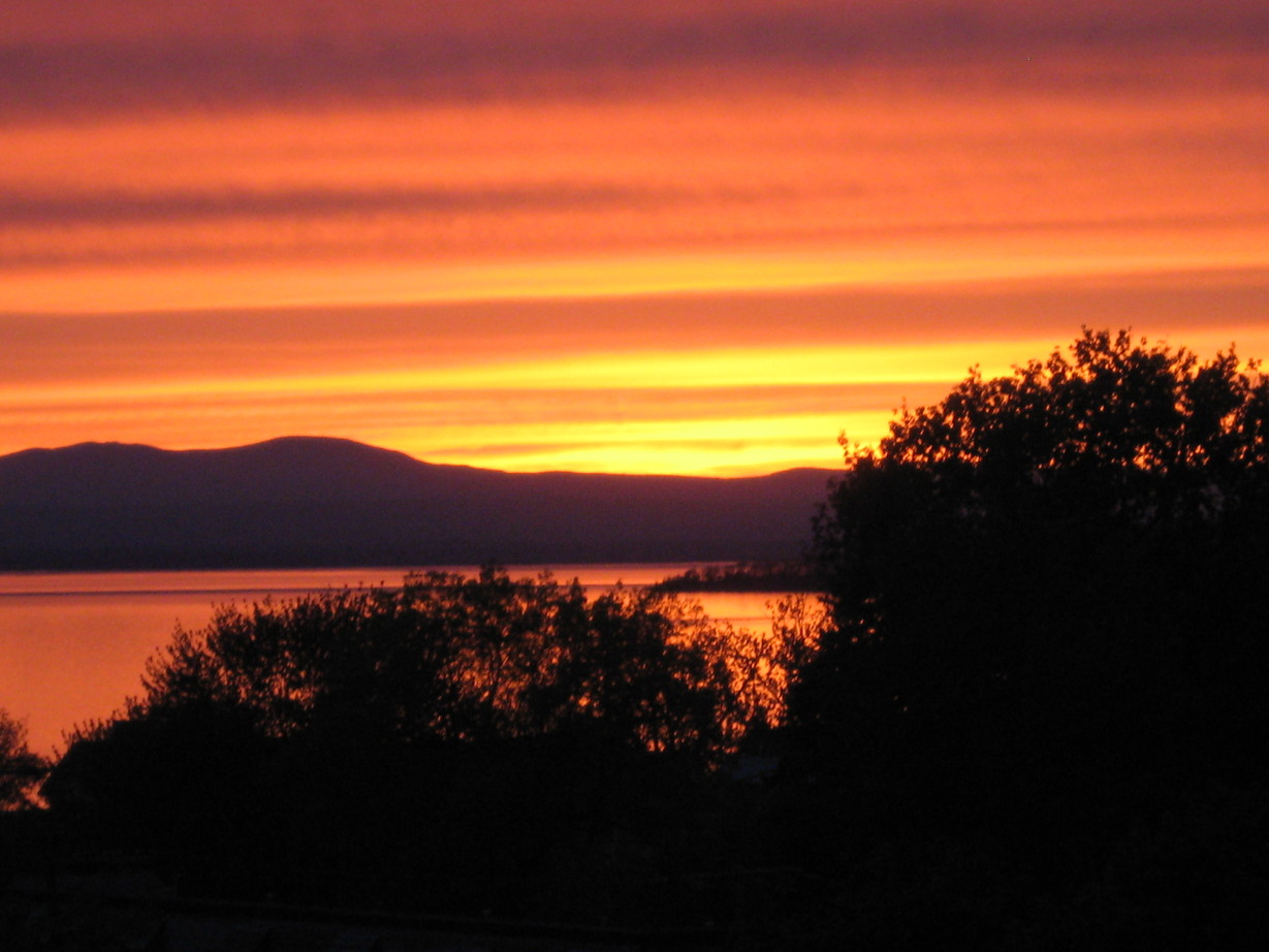 Burlington, VT: sunset outside my window of my apartment overlooking lake champlain