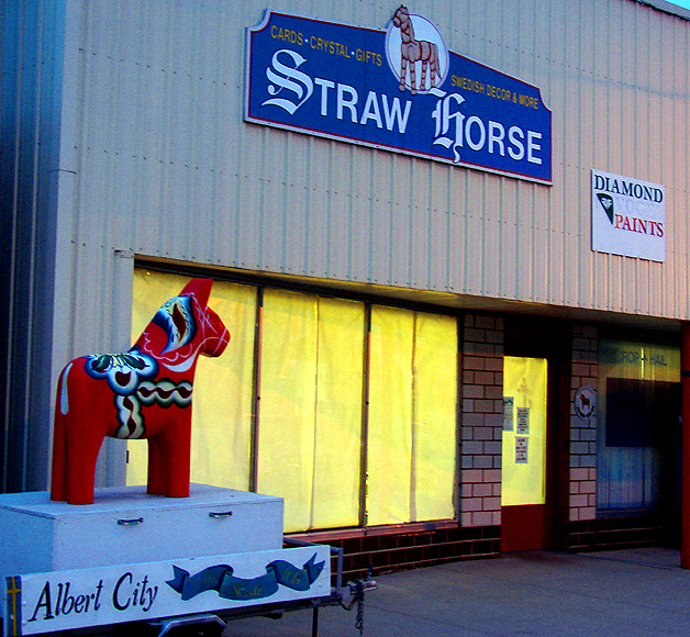 Albert City, IA: Though the title of the this art store is "Straw Horse," (whose slogan is,"Swedish Decor & More!), this bustling fun-stop's sidewalk, displays a painted pony, presumably carved from solid wood. Go figure.