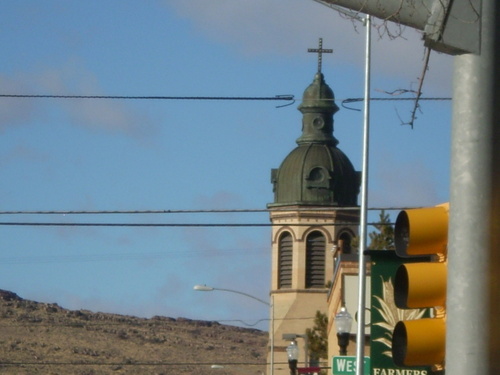 Rawlins, WY: Northerly view of Catholic Church with Stop Light in Rawlins, Wy