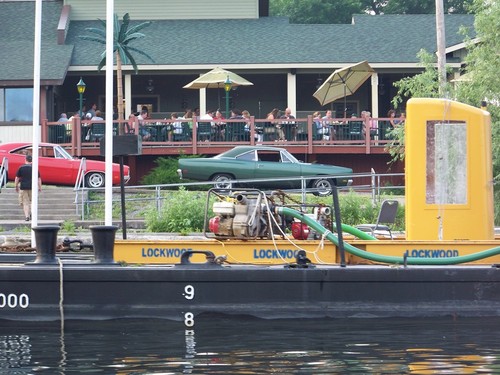 Central Square, NY: Barge moored in front of The Waterfront, Oneida River, June 2008