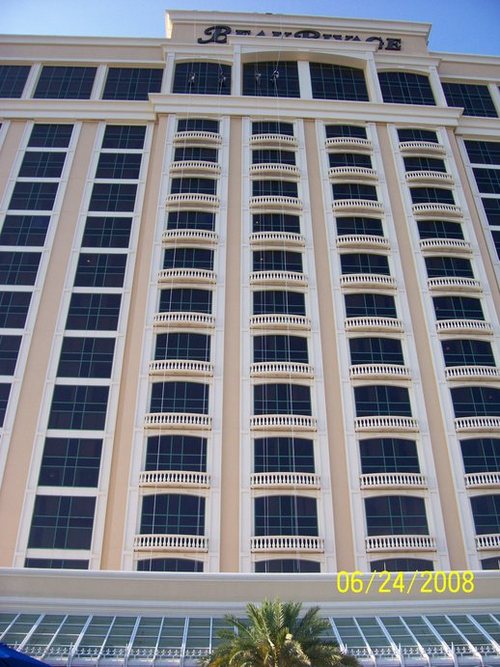 Biloxi, MS: Watching window washers from Beau Rivage pool. See the 4 tiny specks on the highest floor?