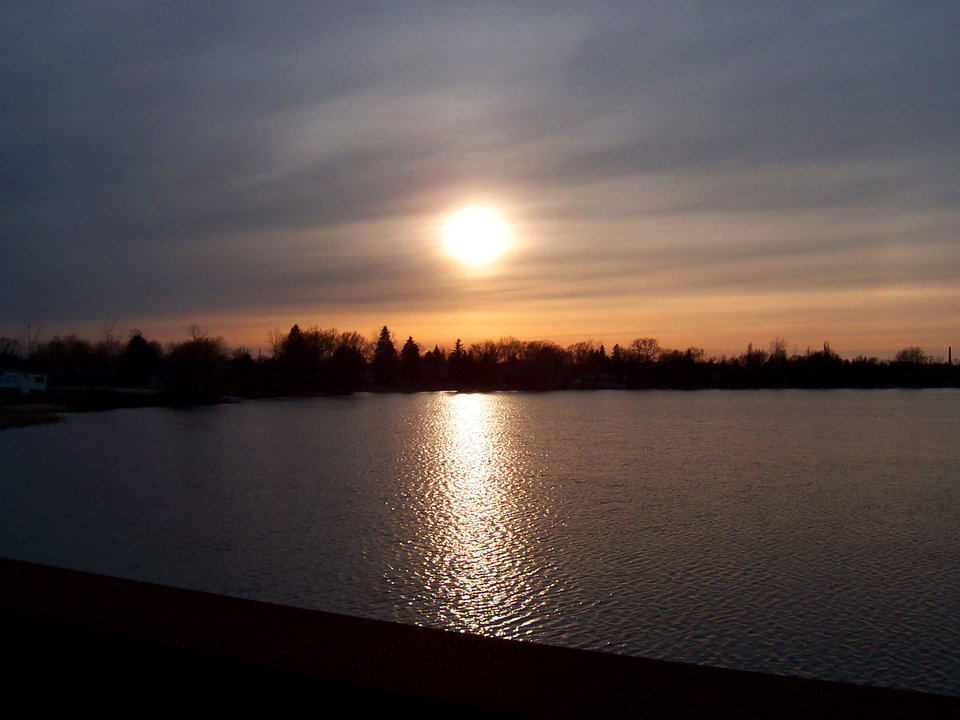 Alpena, MI : A photograph of the river from the bridge (which only consists of railroad tracks).