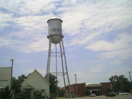 Hobart, OK : one of the many water towers  in Hobart, and the public library