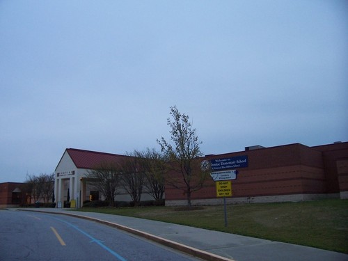 Pontiac, SC: Pontiac Elementary School at twilight. I don't understand the sign; "Do not drop children off yet".