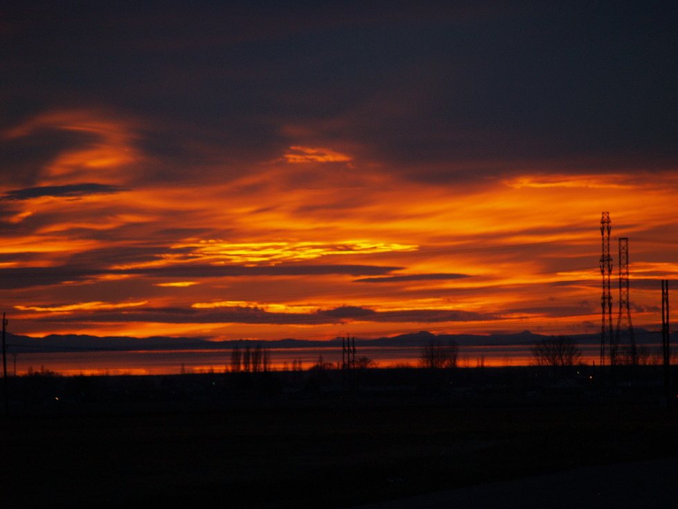 Clearfield, UT: sun set over the salt lake from clearfield