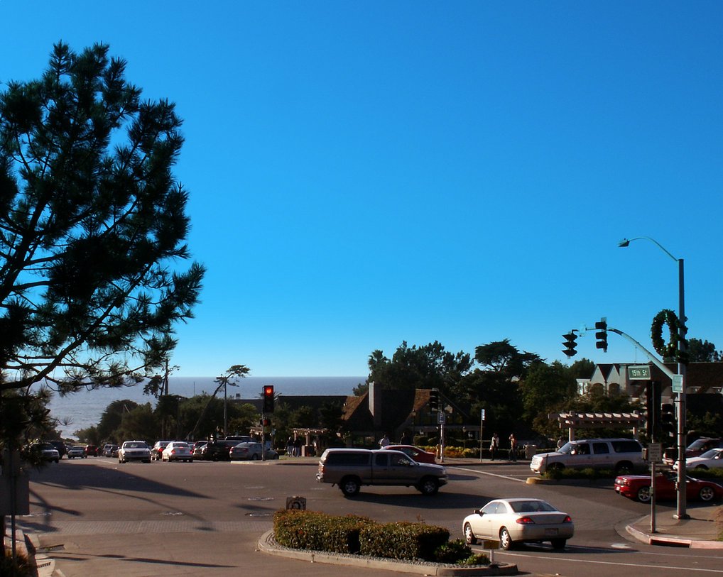 Del Mar, CA : City of Del Mar California offers 2.5 miles of sandy beach with excellent prospects for surfing and just lounging in the sun.  Your vantage is from the corner of 15th Street and Camino Del Mar looking west towards the Pacific Ocean.  On the right and across the street is L’ Auberge Del Mar Resort and Spa. 