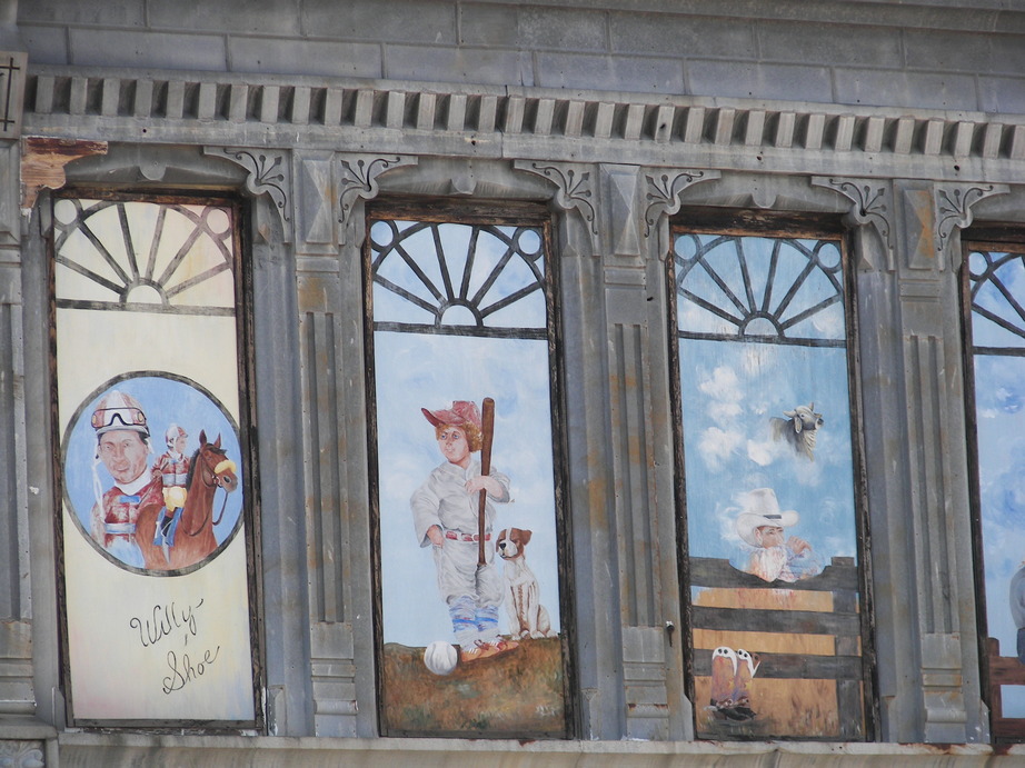 Arkansas City, KS: East side of Summit Ave, murals painted on the main street buildings