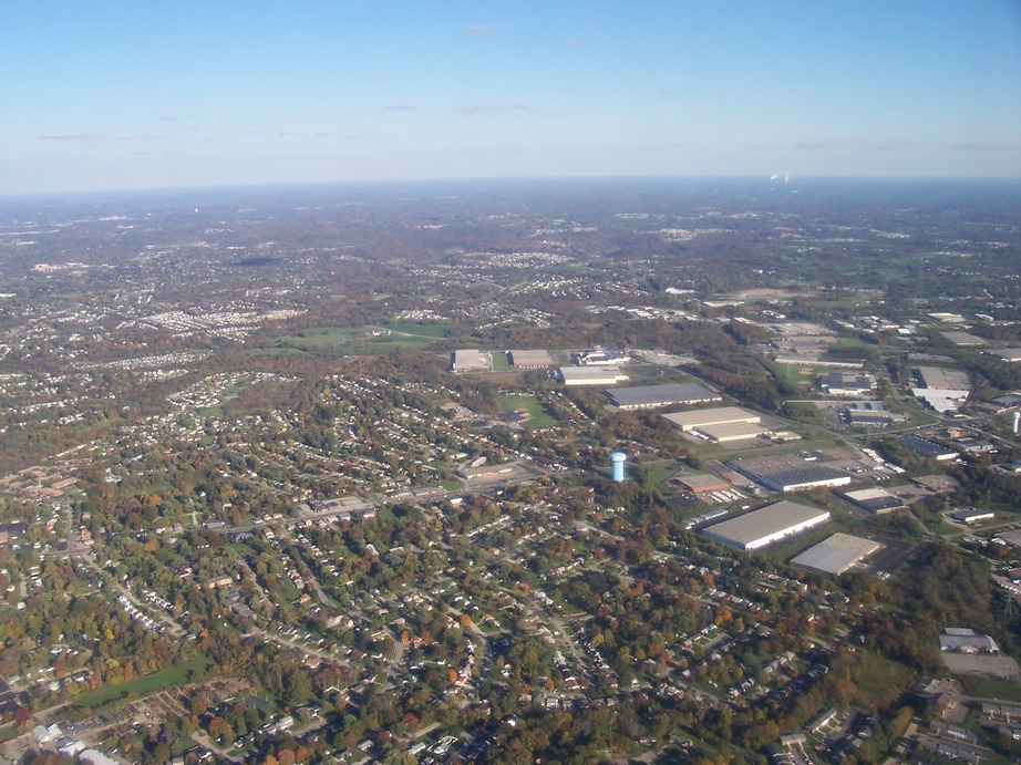 Florence, KY: An aerial shot of Dixie Hwy (US-25) running through a residential area, past a water tower and into an industrial/warehouse district.