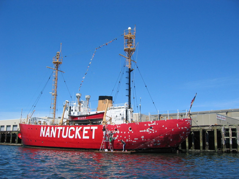 New Bedford, MA: Nantucket Ship being painted in the New Bedford Harbor